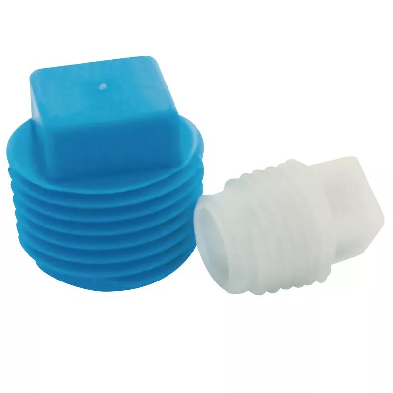 Threaded cap outlet plugs