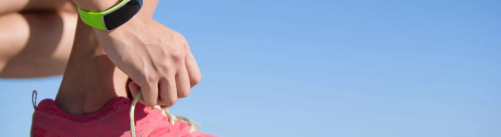 Sport woman wearing a smart watch