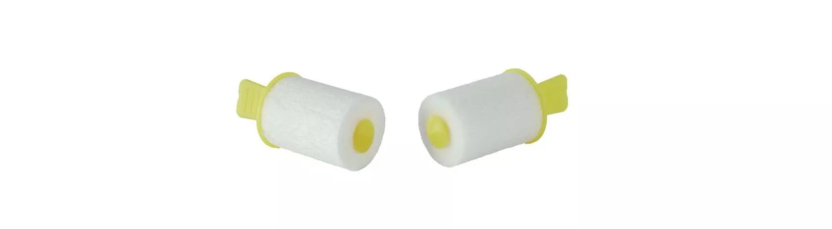 white and yellow fluid absorption plugs 