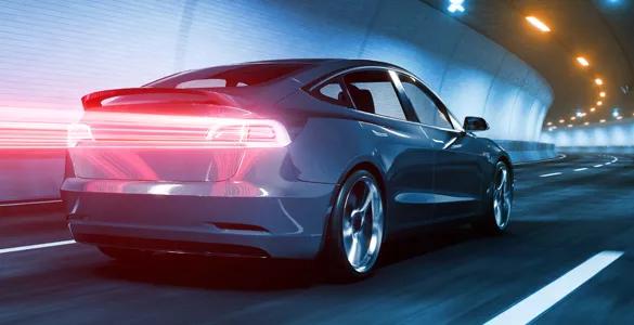 electric vehicle driving along highway