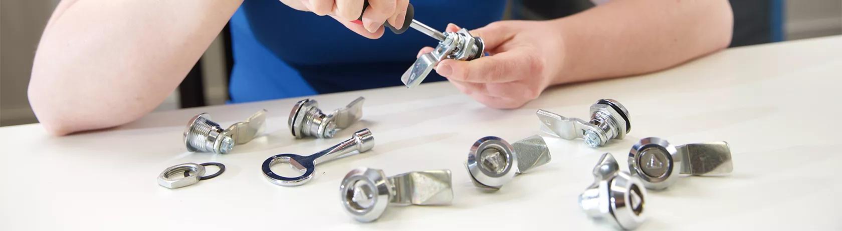 Engineer testing different types of latches