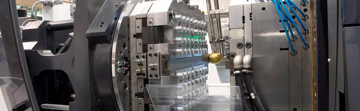 close up on inside of injection molding machine