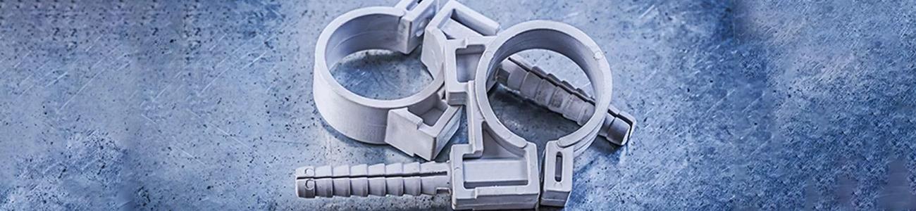Plastic pipe clamps for installing piping